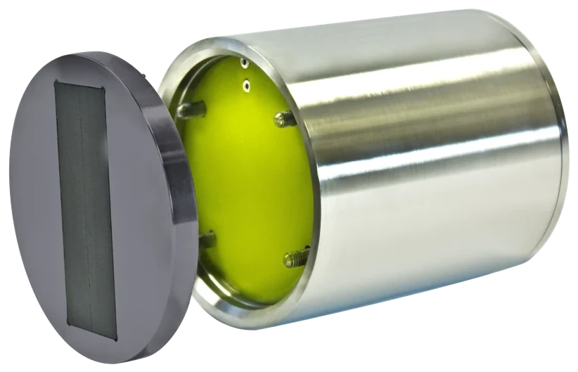 Sensor with the probe head separated from the body, showing the replaceable wear head and its ceramic measuring window